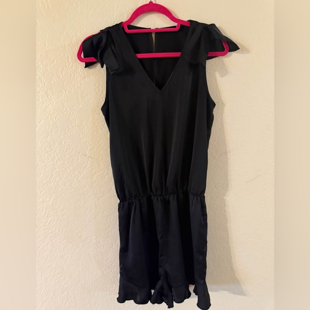 Black Sleeveless Romper with Ruffle Details